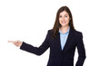© leungchopan - Caucasian businesswoman with finger point aside