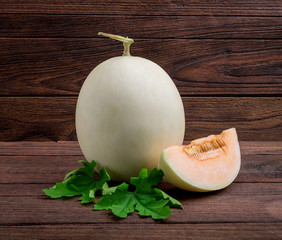 Wall Mural - Melon with slices and leaves