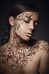  Woman with creative ornament makeup
