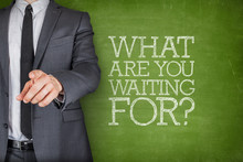 What Are You Waiting On On Blackboard With Businessman