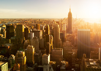 Fototapete - Manhattan Skyline bei Sonnenuntergang in New York 