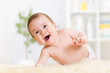 baby crawling on fluffy carpet at home