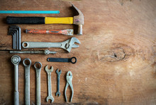 Set Of Work Tools On Old Grunge Wood Background With Copy Space