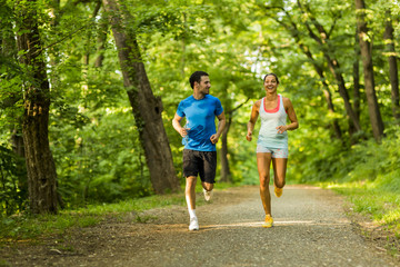 Young people running in nature