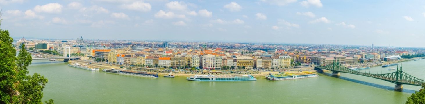 Panorama View over danube river in budapest during one sunny day at the end of july.