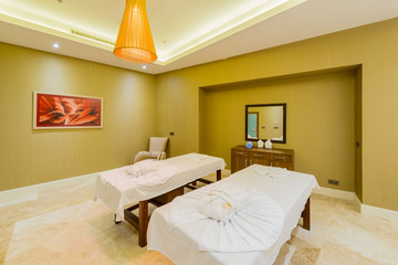 Spa room with many beds