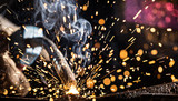 Fototapeta  - Welder in action with bright sparks. Construction and manufacturing theme.
