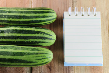 Book and cucumber.