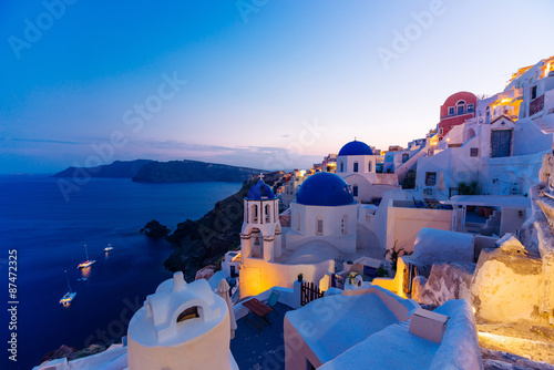 Plakat na zamówienie Famous Oia blue dome churches at night, Santorini, Greece