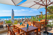 Restaurant tables on Palombaggia beach, southern Corsica island, France