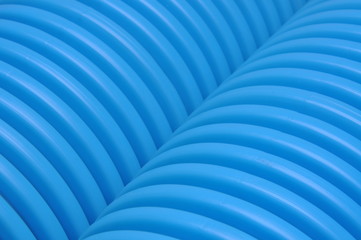 Wall Mural - Blue curvilinear tubes for industry