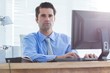 © WavebreakMediaMicro - Serious businessman using computer