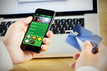 Poster - Composite image of businessman using smartphone