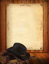 Western Background With Cowboy Clothes And Old Paper For Text
