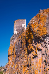 Canvas Print - The ruins of the tower of a medieval castle on a rock in France