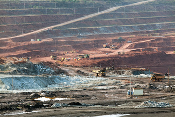 Part of a pit with big mining truck working