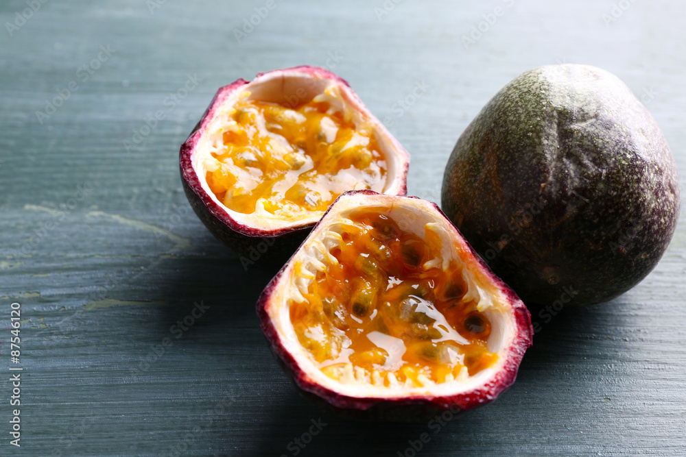 Passion fruits on wooden background