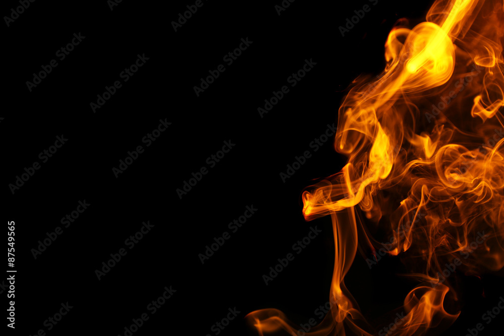 Color smoke from match on dark background