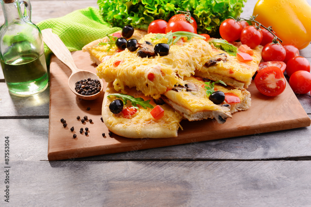 Delicious homemade pizza on table close-up