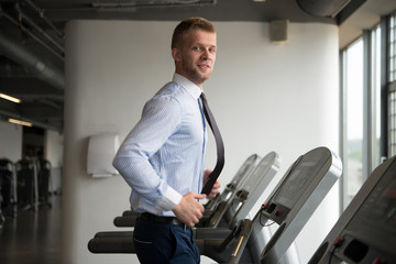 Businessman Running On Treadmill