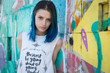 © 445017 - Young beautiful girl agains graffiti wall
