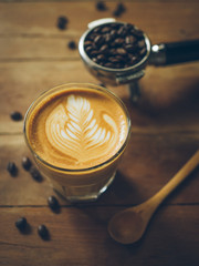 cup of coffee latte on the wood texture