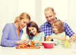 © Syda Productions - happy family with two kids making dinner at home