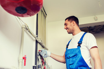 Poster - builder or plumber working indoors