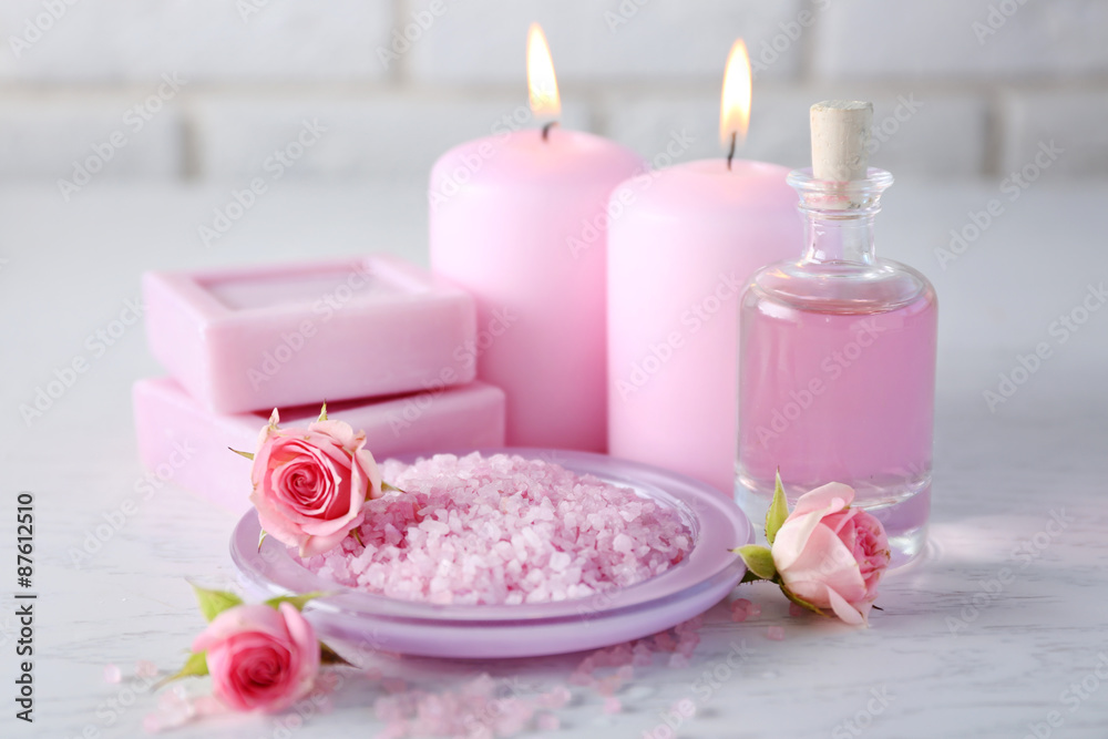 Beautiful composition of spa treatment on white wooden table