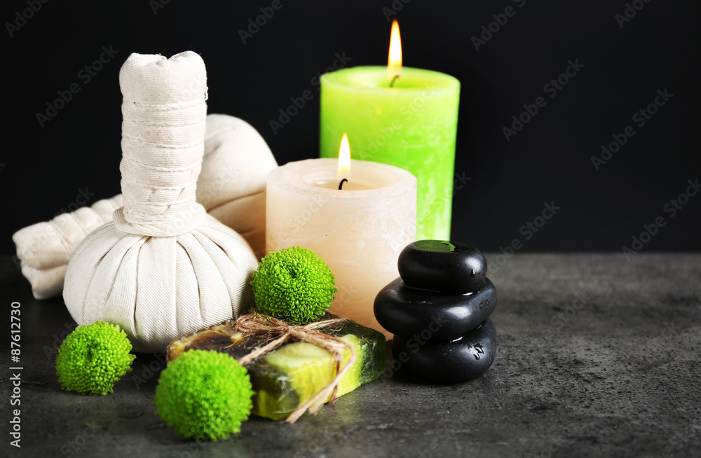 Beautiful composition of spa treatment on dark background