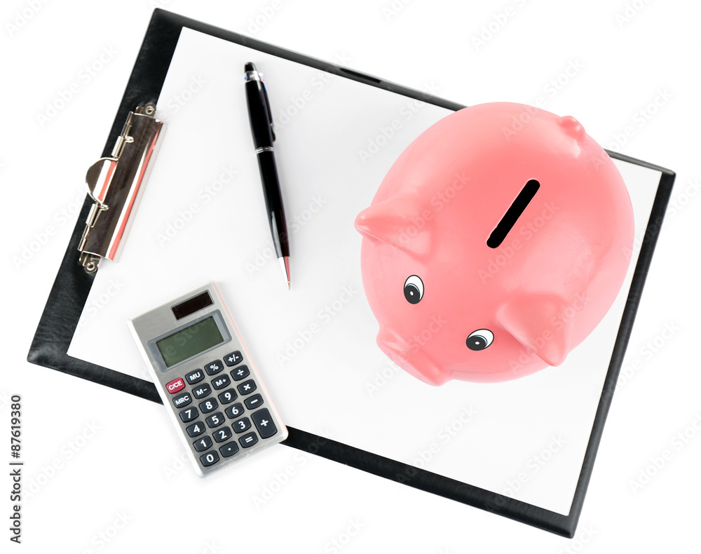 Piggy bank with calculator and clipboard isolated on white