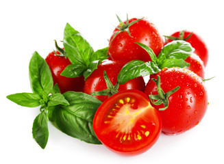 Wall Mural - Cherry tomatoes with basil isolated on white