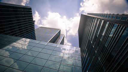 Wall Mural - Docklands Skyscrapers. A low angle view of the glass and steel skyscrapers in London's Docklands district, a key UK financial and business district.