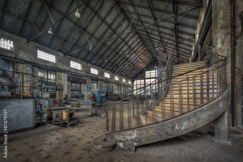 Naklejka - mata magnetyczna na lodówkę Imposing staircase inside the hall of an abandoned power plant