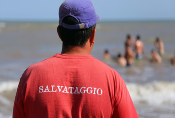 Wall Mural - Lifeguard and the red Jersey with RESCUE written in italian