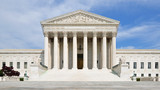 Fototapeta  - The front facade of the United States Supreme Court in Washington DC, USA.