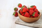Fototapeta Mapy - Ripe strawberries in a bowl