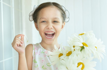 Wall Mural - little girl with dasies flowers