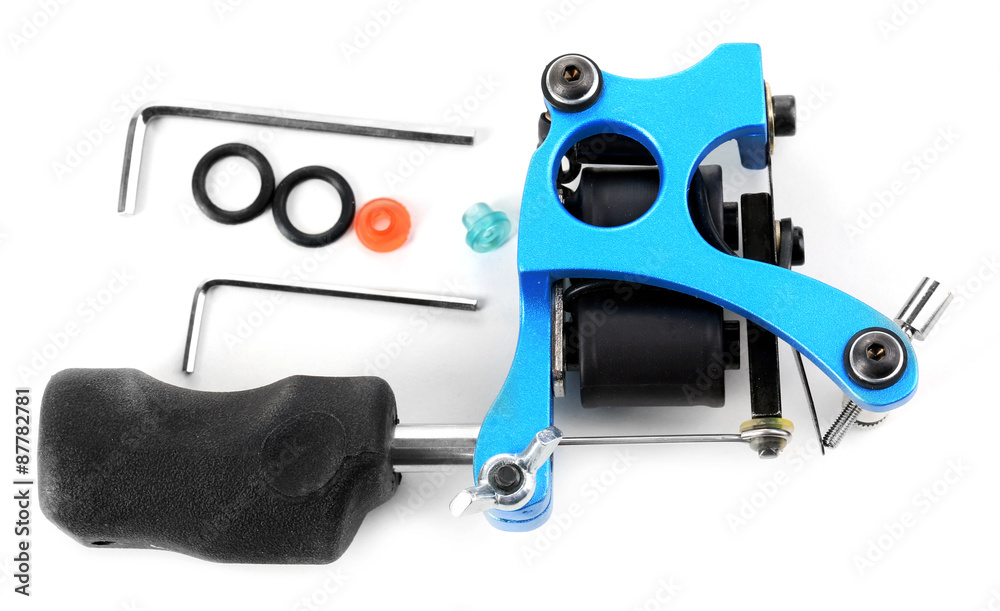 Tattoo machine and tattoo Supplies, isolated on white