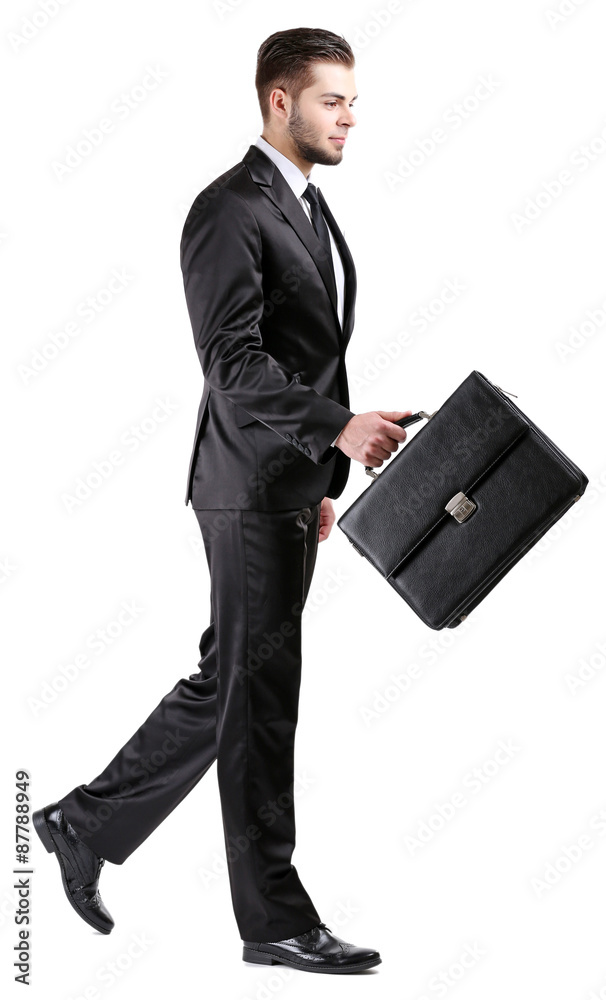 Elegant man in suit with briefcase isolated on white