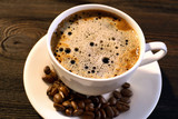 Fototapeta Boho - Cup of coffee on table close up