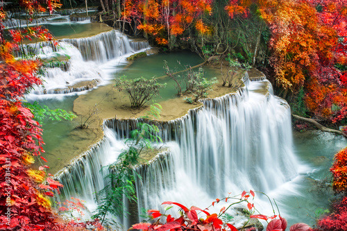 Naklejka na kafelki beautiful waterfall in tropical forest 