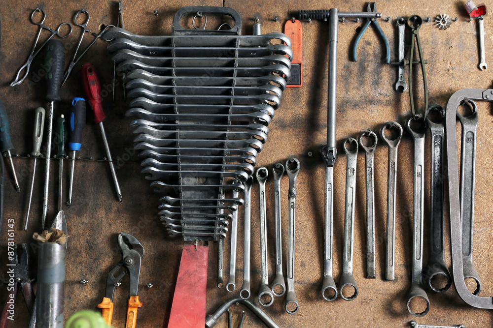 Different tools on workplace in garage