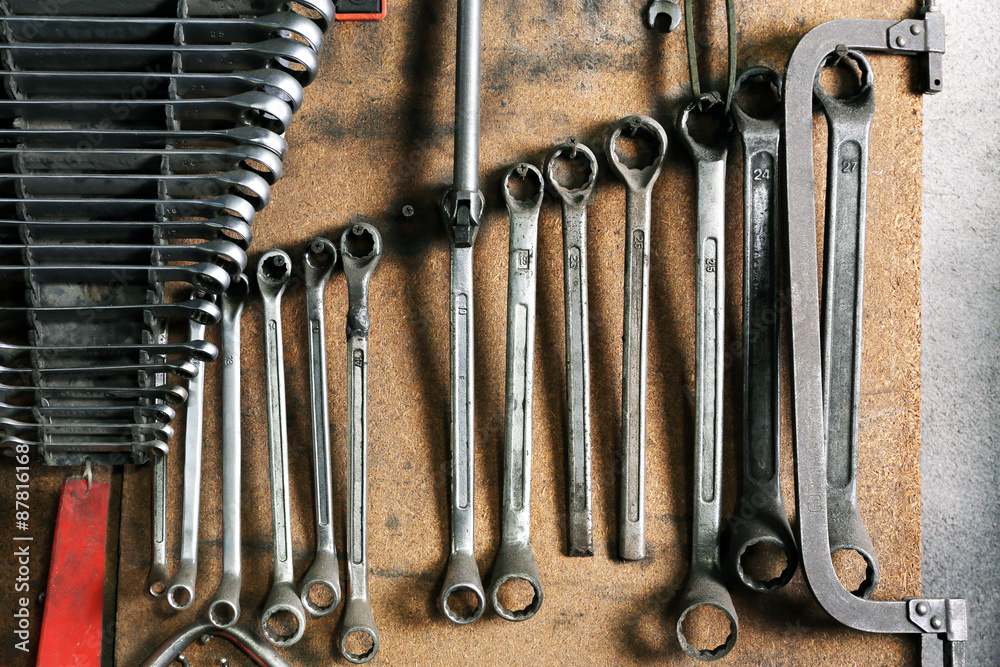Different tools on workplace in garage
