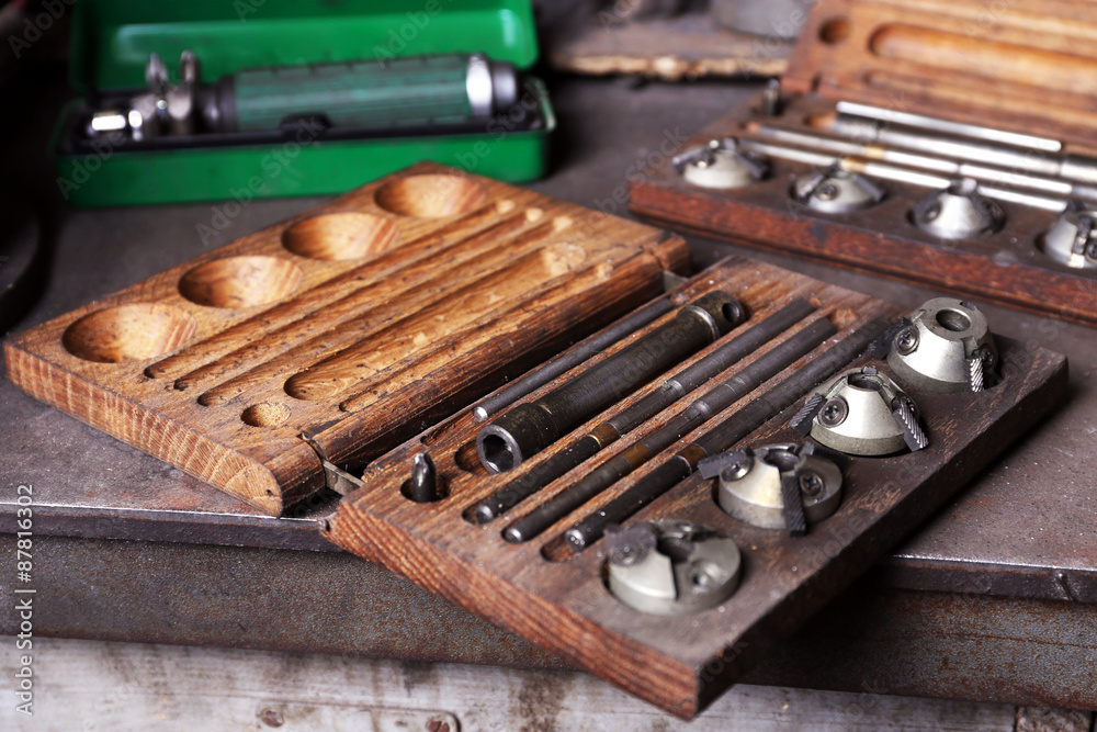 Different tools on workplace in garage