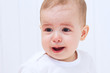 Crying beautiful baby on white background 