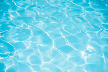  Blue water surface in swimming pool