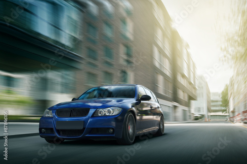 Fotografia, Obraz Car speed drive fast on the city road at daytime