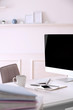 © Africa Studio - Workplace with computer in room