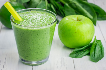 Healthy smoothie with green apple, spinach, lime and coconut milk